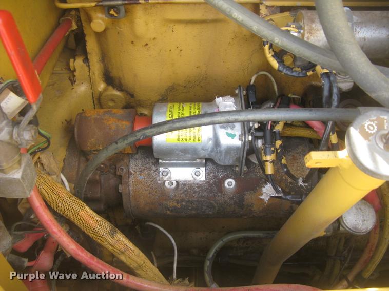 image for item L2333 2001 Caterpillar 140H motor grader