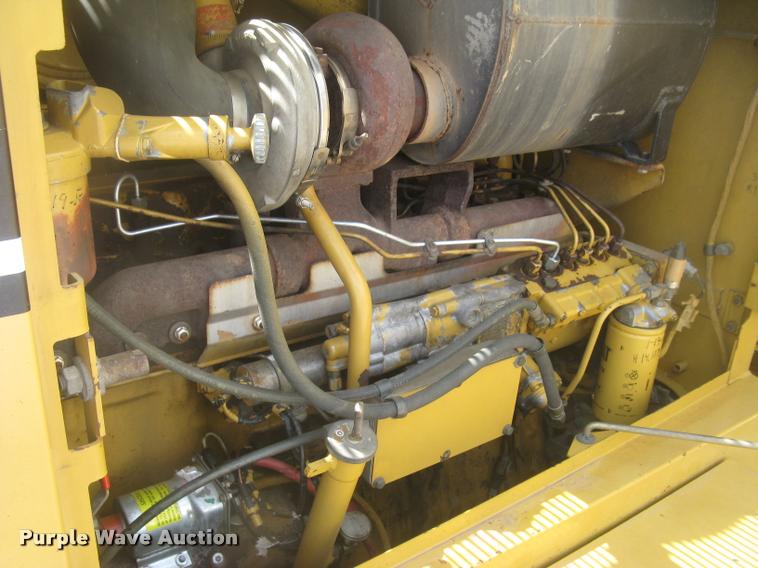 image for item L2333 2001 Caterpillar 140H motor grader