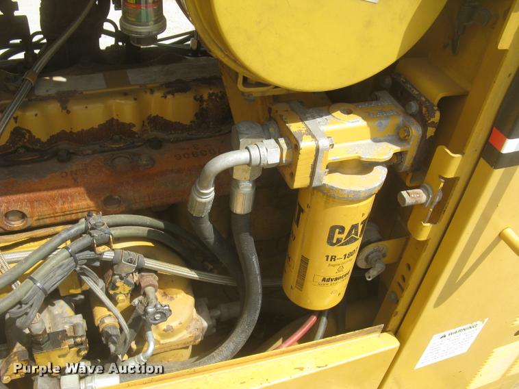 image for item L2333 2001 Caterpillar 140H motor grader