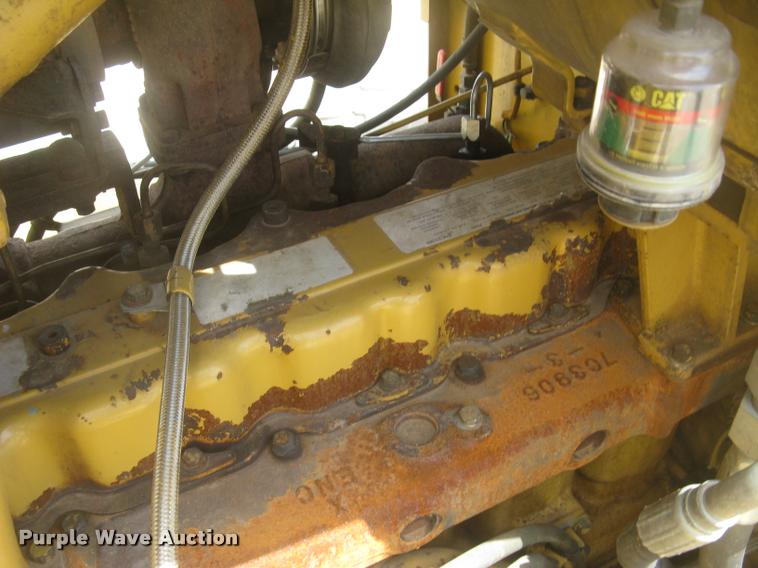 image for item L2333 2001 Caterpillar 140H motor grader