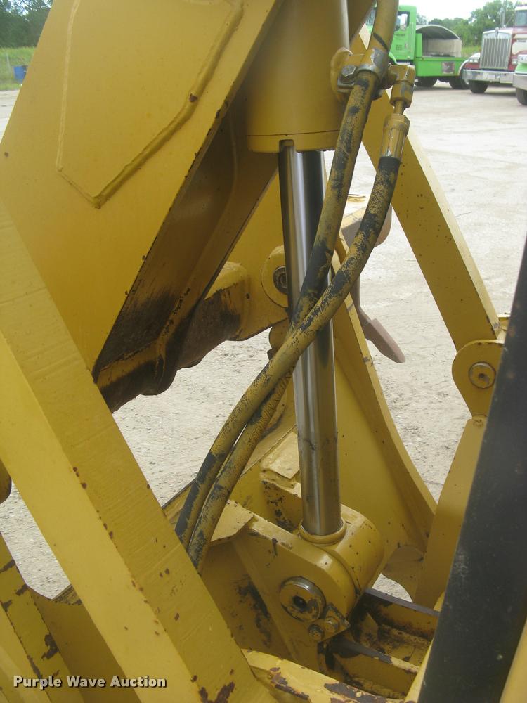 image for item L2333 2001 Caterpillar 140H motor grader