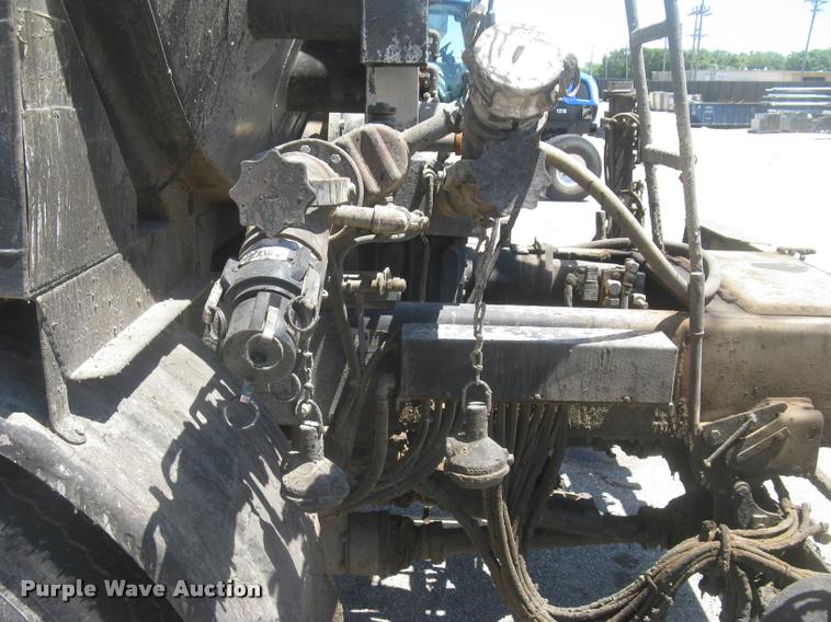 image for item L2340 2001 Peterbilt 330 asphalt distribution truck