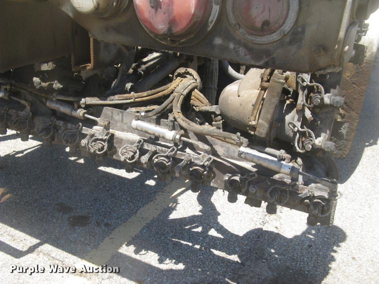 image for item L2340 2001 Peterbilt 330 asphalt distribution truck