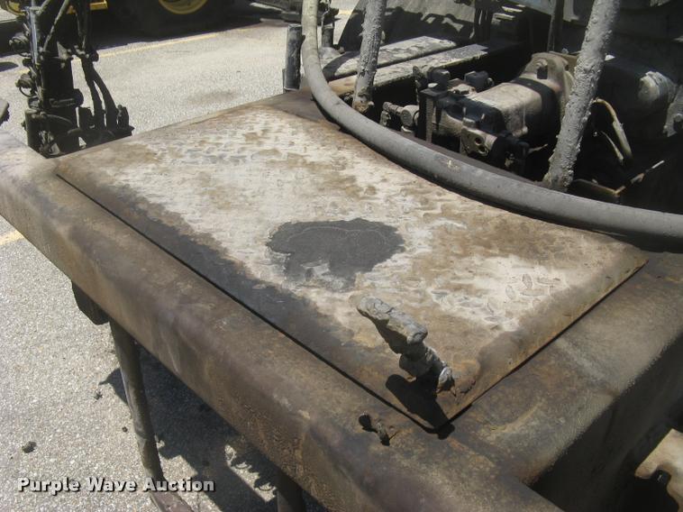 image for item L2340 2001 Peterbilt 330 asphalt distribution truck