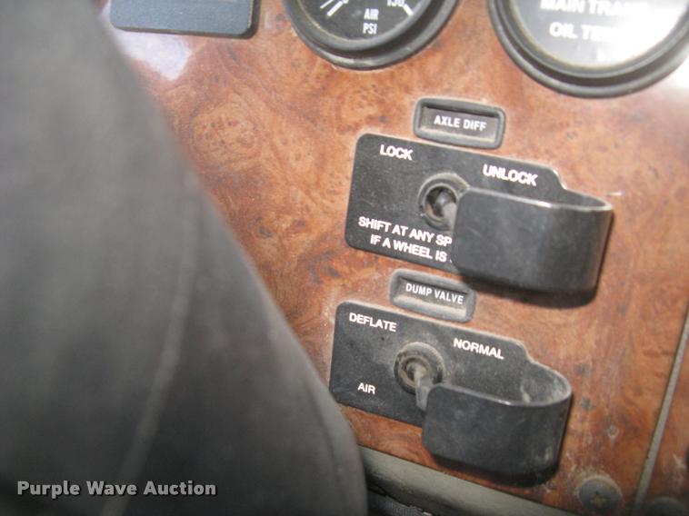 image for item L2340 2001 Peterbilt 330 asphalt distribution truck