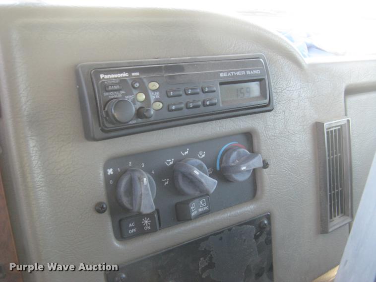 image for item L2340 2001 Peterbilt 330 asphalt distribution truck