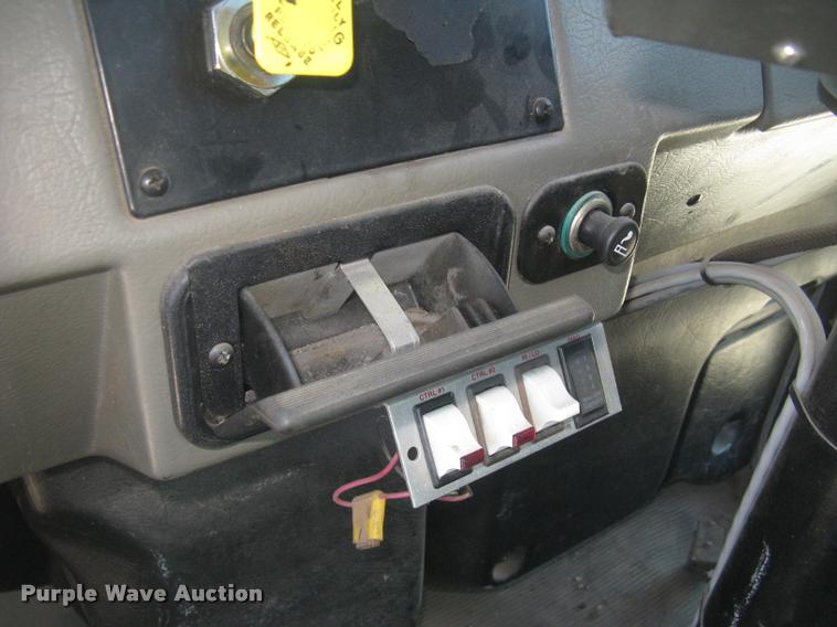 image for item L2340 2001 Peterbilt 330 asphalt distribution truck