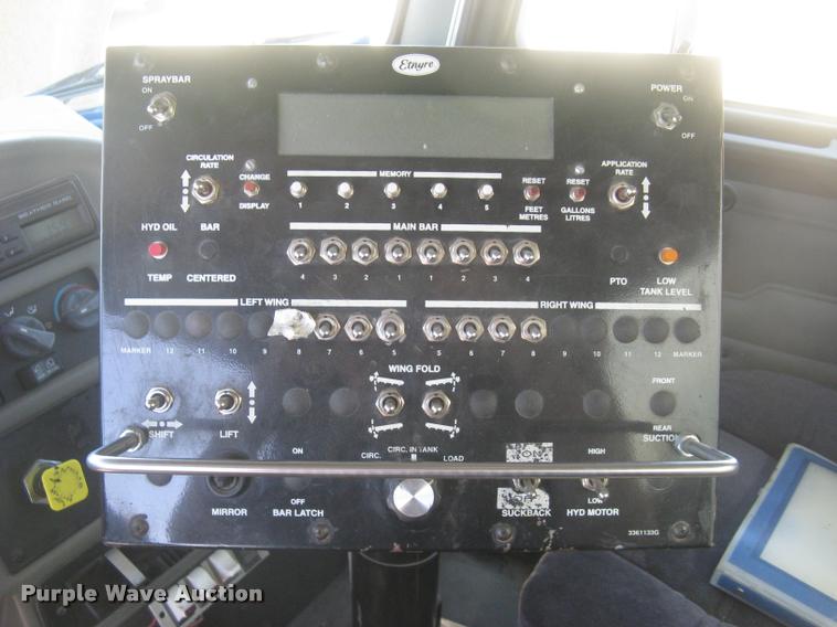 image for item L2340 2001 Peterbilt 330 asphalt distribution truck