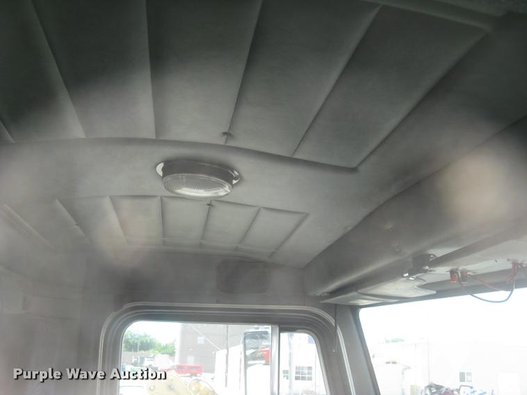 image for item L2340 2001 Peterbilt 330 asphalt distribution truck