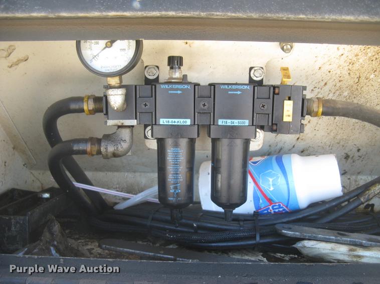 image for item L2340 2001 Peterbilt 330 asphalt distribution truck