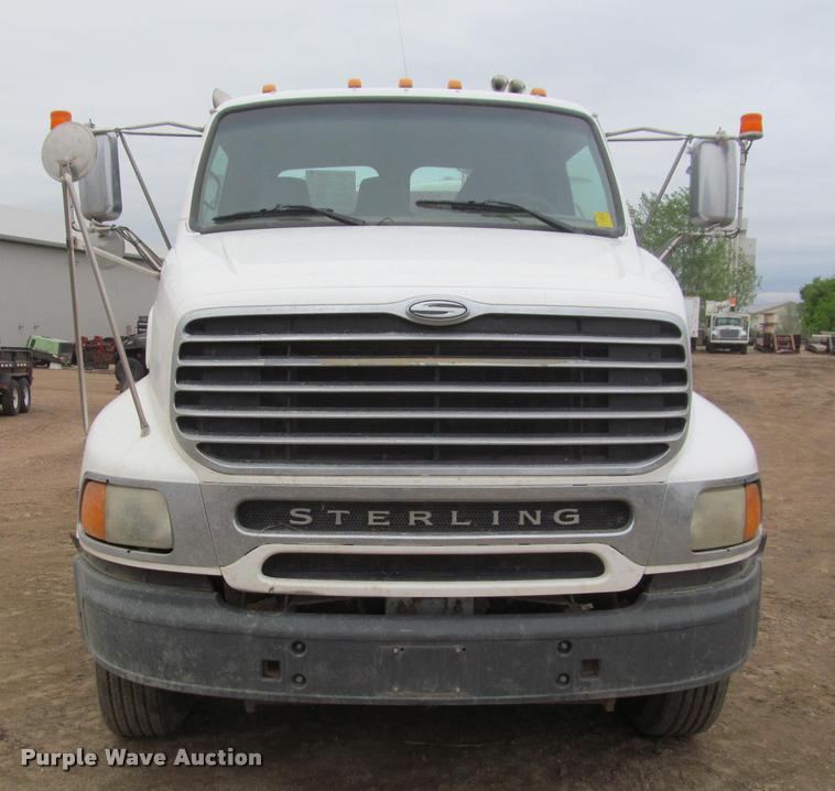 image for item DA1059 2006 Sterling A9500 flatbed truck with Ditch Witch mud mixing system