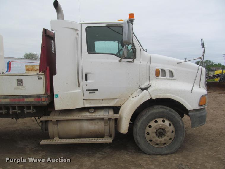 image for item DA1059 2006 Sterling A9500 flatbed truck with Ditch Witch mud mixing system