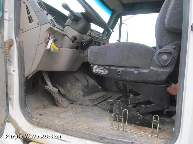 image for item DA1059 2006 Sterling A9500 flatbed truck with Ditch Witch mud mixing system