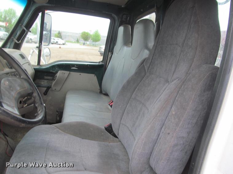 image for item DA1059 2006 Sterling A9500 flatbed truck with Ditch Witch mud mixing system