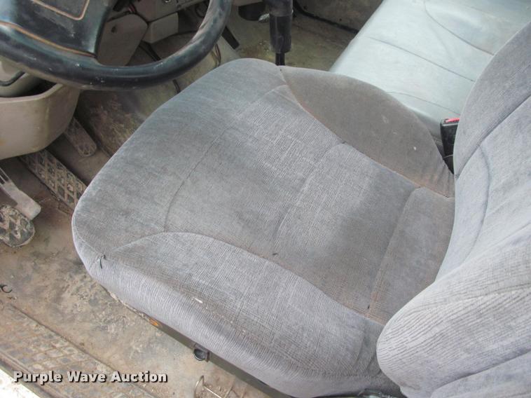 image for item DA1059 2006 Sterling A9500 flatbed truck with Ditch Witch mud mixing system