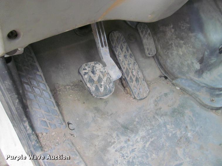 image for item DA1059 2006 Sterling A9500 flatbed truck with Ditch Witch mud mixing system