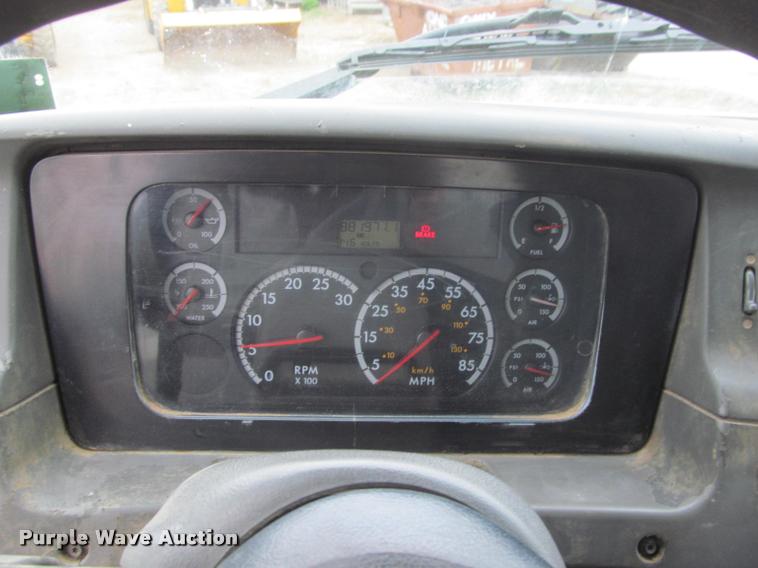 image for item DA1059 2006 Sterling A9500 flatbed truck with Ditch Witch mud mixing system