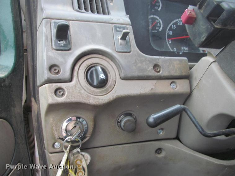 image for item DA1059 2006 Sterling A9500 flatbed truck with Ditch Witch mud mixing system