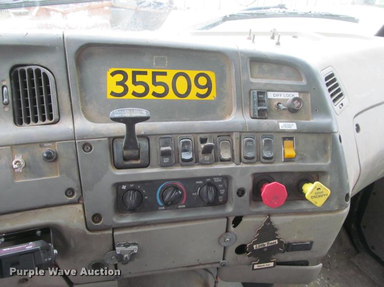 image for item DA1059 2006 Sterling A9500 flatbed truck with Ditch Witch mud mixing system