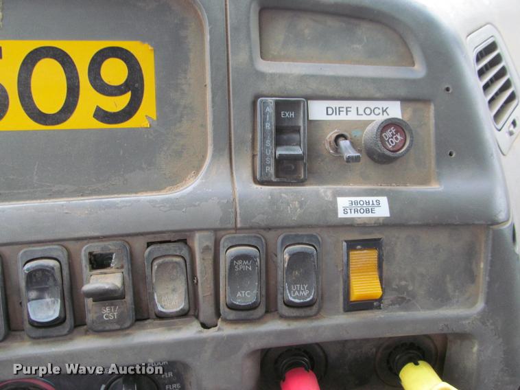 image for item DA1059 2006 Sterling A9500 flatbed truck with Ditch Witch mud mixing system