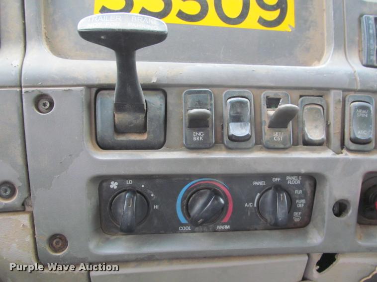 image for item DA1059 2006 Sterling A9500 flatbed truck with Ditch Witch mud mixing system