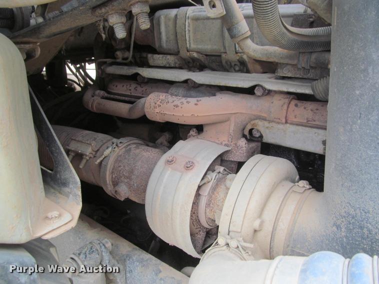 image for item DA1059 2006 Sterling A9500 flatbed truck with Ditch Witch mud mixing system