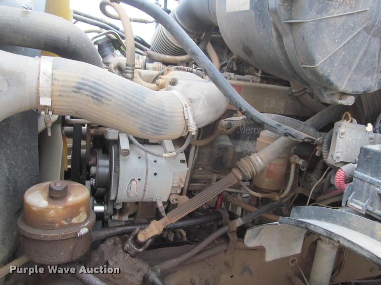 image for item DA1059 2006 Sterling A9500 flatbed truck with Ditch Witch mud mixing system