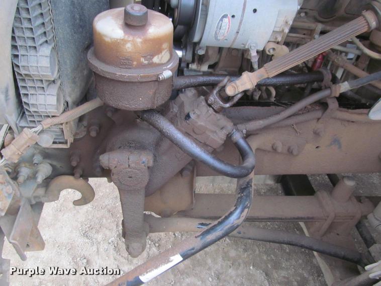 image for item DA1059 2006 Sterling A9500 flatbed truck with Ditch Witch mud mixing system