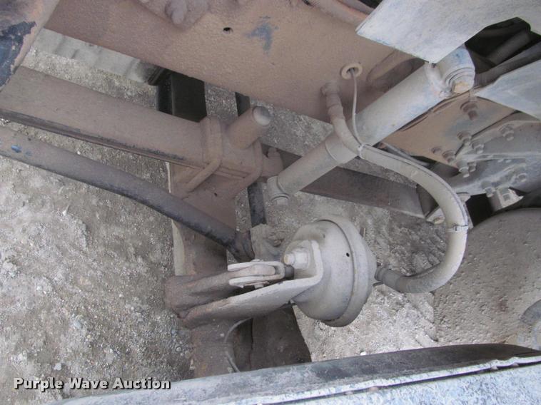 image for item DA1059 2006 Sterling A9500 flatbed truck with Ditch Witch mud mixing system