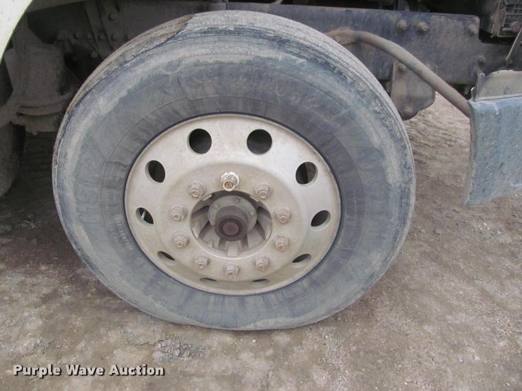 image for item DA1059 2006 Sterling A9500 flatbed truck with Ditch Witch mud mixing system