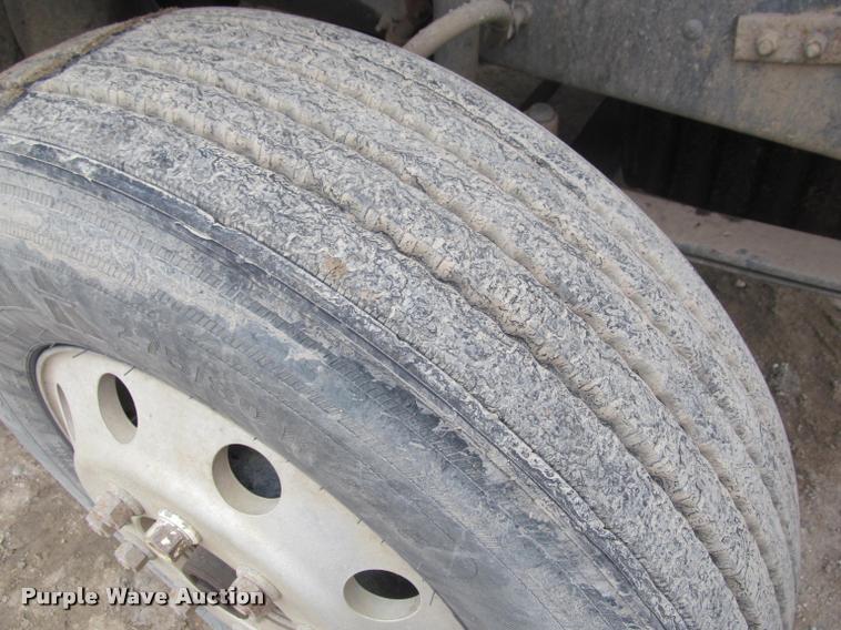 image for item DA1059 2006 Sterling A9500 flatbed truck with Ditch Witch mud mixing system