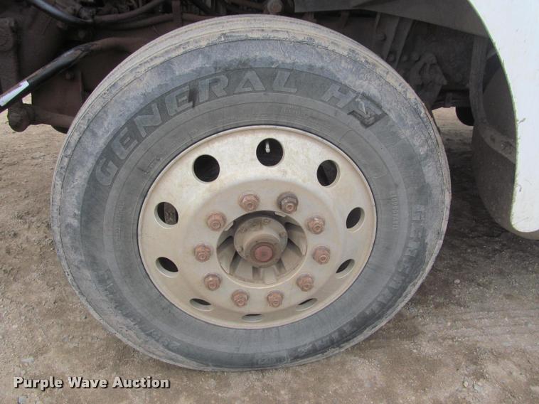 image for item DA1059 2006 Sterling A9500 flatbed truck with Ditch Witch mud mixing system