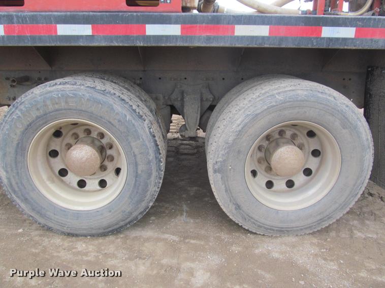 image for item DA1059 2006 Sterling A9500 flatbed truck with Ditch Witch mud mixing system