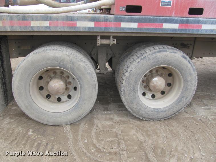image for item DA1059 2006 Sterling A9500 flatbed truck with Ditch Witch mud mixing system