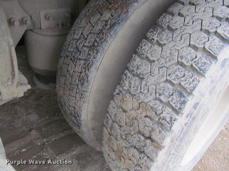 image for item DA1059 2006 Sterling A9500 flatbed truck with Ditch Witch mud mixing system