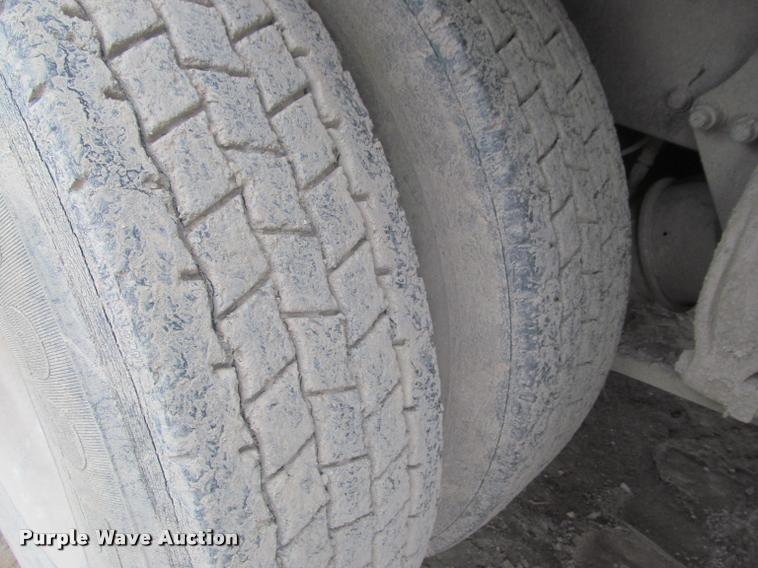 image for item DA1059 2006 Sterling A9500 flatbed truck with Ditch Witch mud mixing system