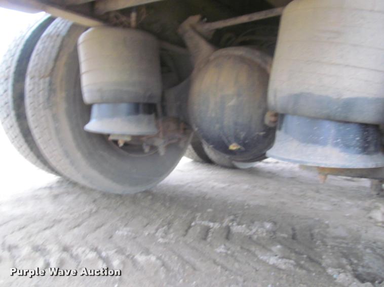 image for item DA1059 2006 Sterling A9500 flatbed truck with Ditch Witch mud mixing system