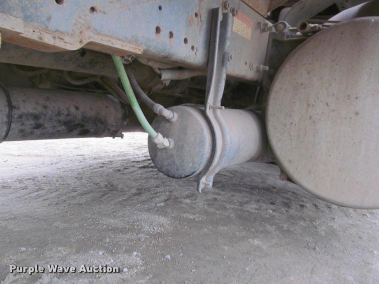 image for item DA1059 2006 Sterling A9500 flatbed truck with Ditch Witch mud mixing system