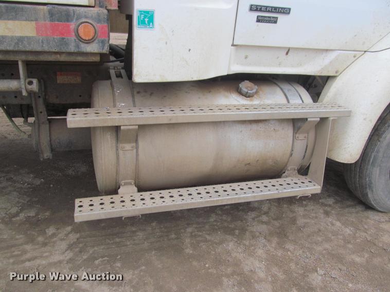 image for item DA1059 2006 Sterling A9500 flatbed truck with Ditch Witch mud mixing system