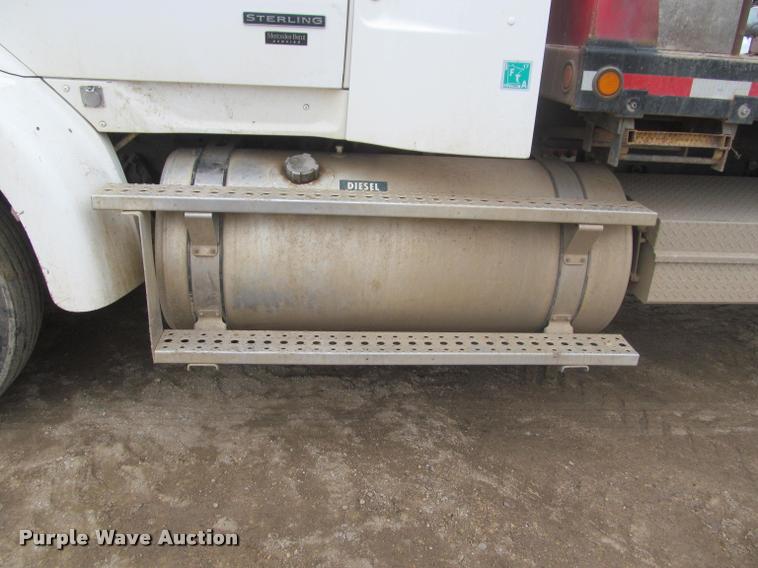image for item DA1059 2006 Sterling A9500 flatbed truck with Ditch Witch mud mixing system