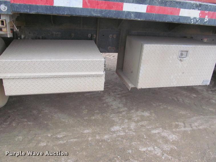 image for item DA1059 2006 Sterling A9500 flatbed truck with Ditch Witch mud mixing system