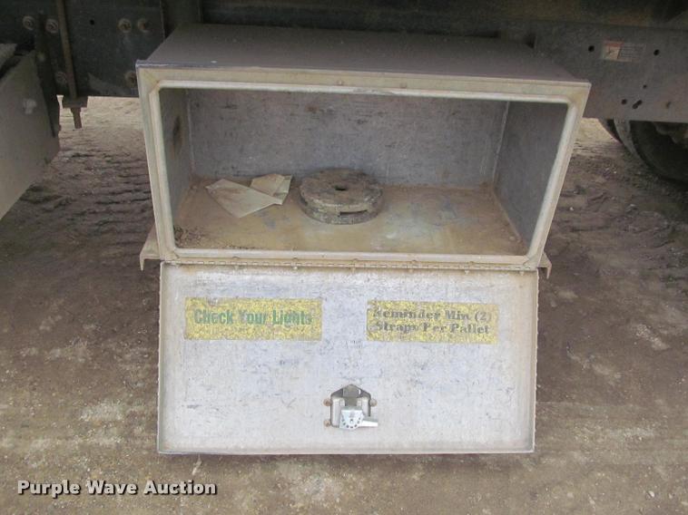 image for item DA1059 2006 Sterling A9500 flatbed truck with Ditch Witch mud mixing system