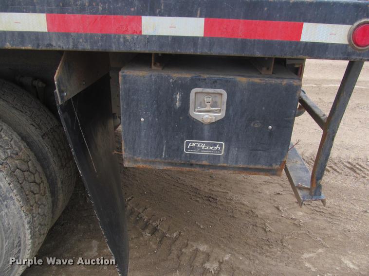 image for item DA1059 2006 Sterling A9500 flatbed truck with Ditch Witch mud mixing system