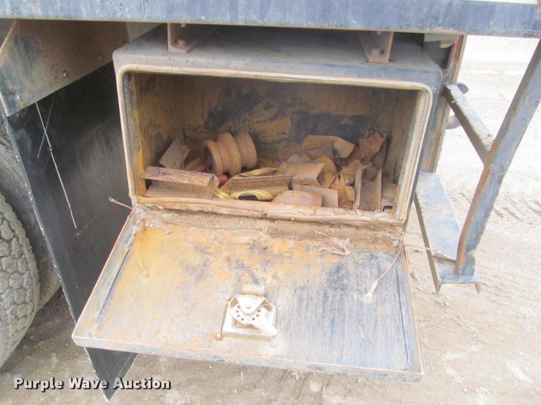 image for item DA1059 2006 Sterling A9500 flatbed truck with Ditch Witch mud mixing system