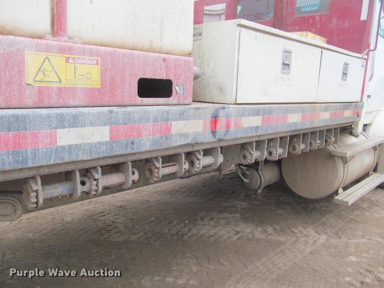 image for item DA1059 2006 Sterling A9500 flatbed truck with Ditch Witch mud mixing system