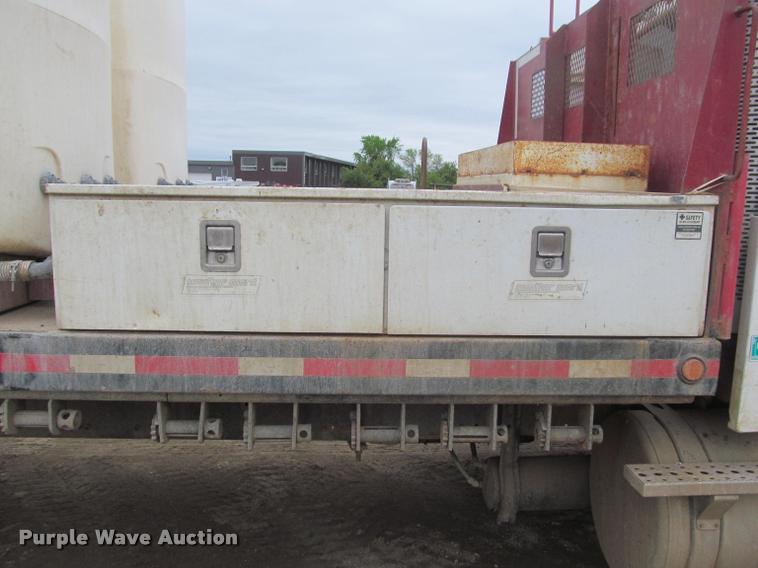 image for item DA1059 2006 Sterling A9500 flatbed truck with Ditch Witch mud mixing system