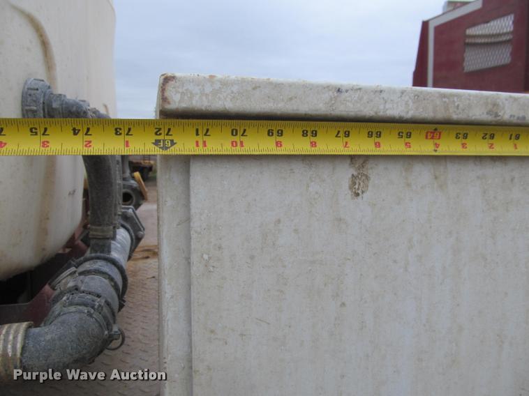 image for item DA1059 2006 Sterling A9500 flatbed truck with Ditch Witch mud mixing system