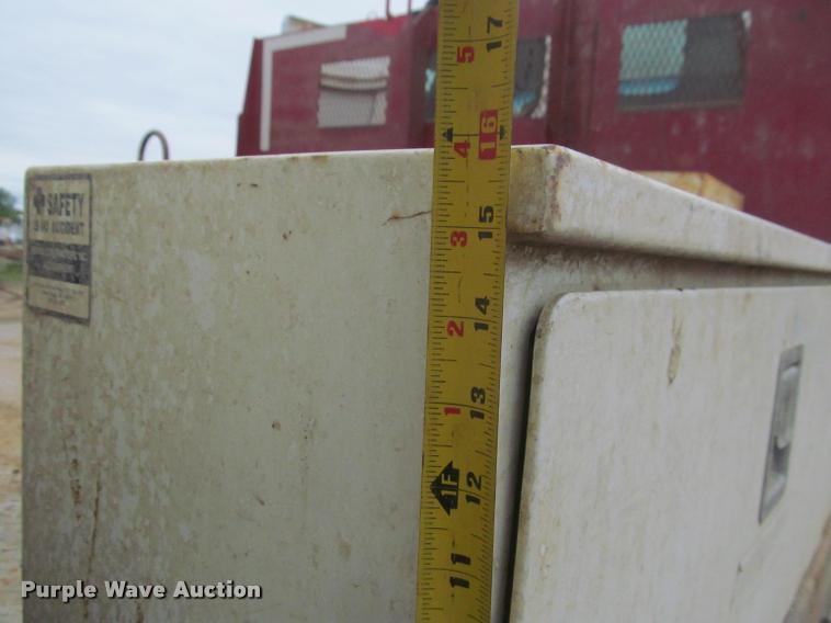 image for item DA1059 2006 Sterling A9500 flatbed truck with Ditch Witch mud mixing system