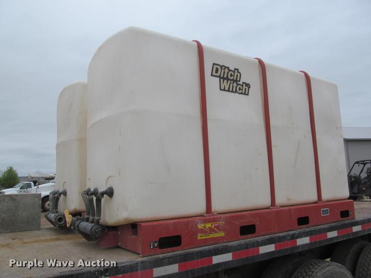 image for item DA1059 2006 Sterling A9500 flatbed truck with Ditch Witch mud mixing system