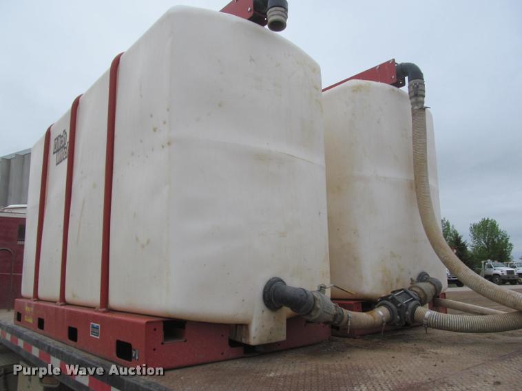 image for item DA1059 2006 Sterling A9500 flatbed truck with Ditch Witch mud mixing system